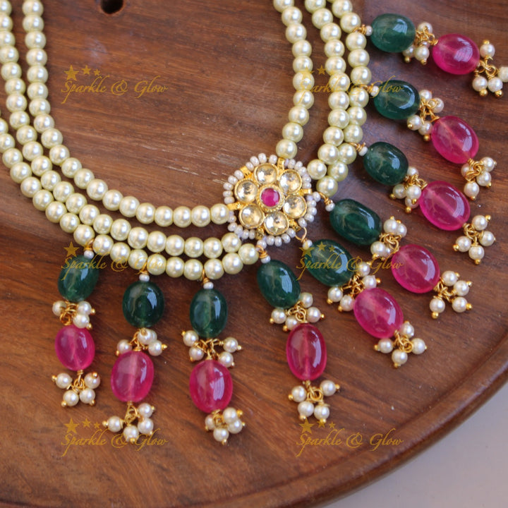 Beautiful three layer kundan short necklace with pink and green bead drops