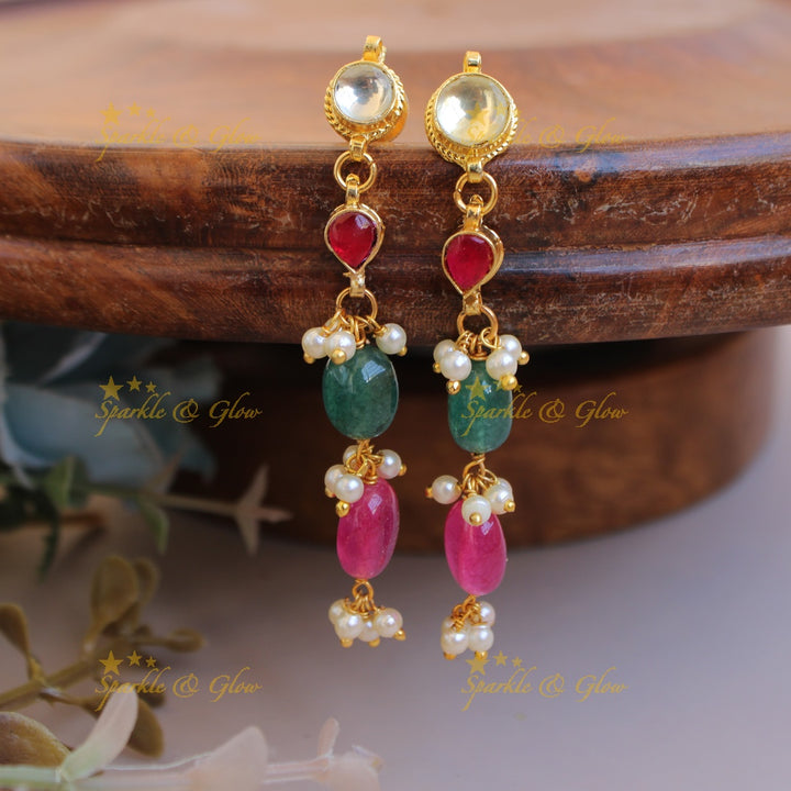 Beautiful three layer kundan short necklace with pink and green bead drops