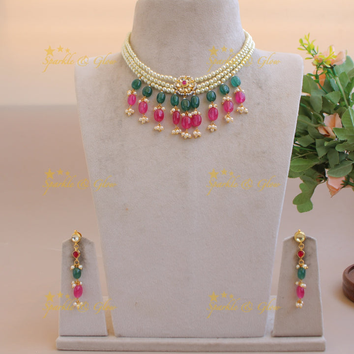 Beautiful three layer kundan short necklace with pink and green bead drops