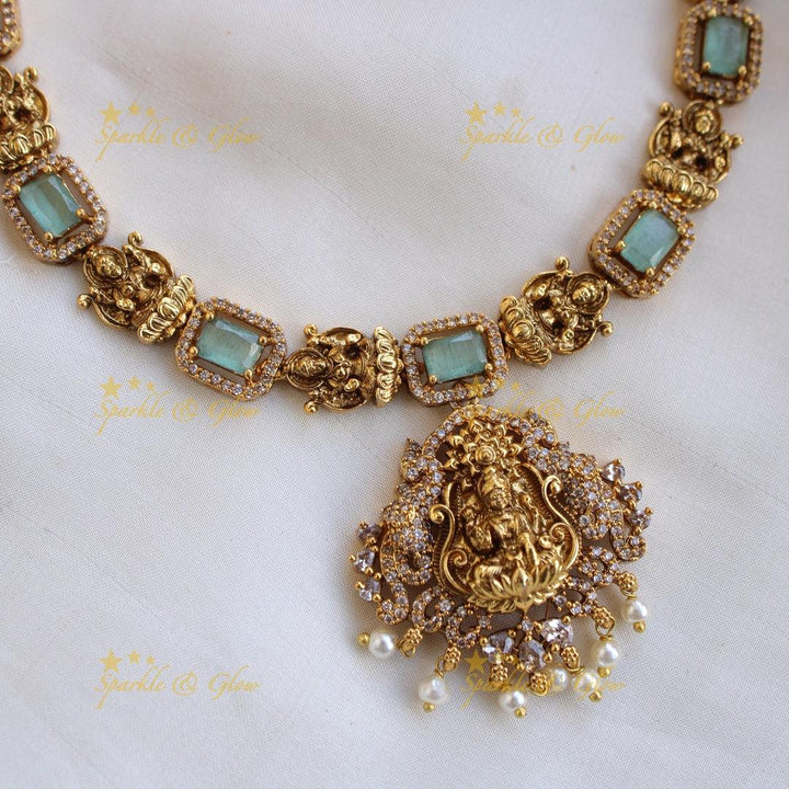 Gorgeous Lakshmi carved long necklace with CZ stones and pearls - mint green - Sparkle and Glow