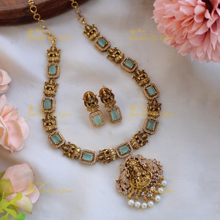 Elegant Lakshmi carved short necklace with CZ stones and pearls - purple