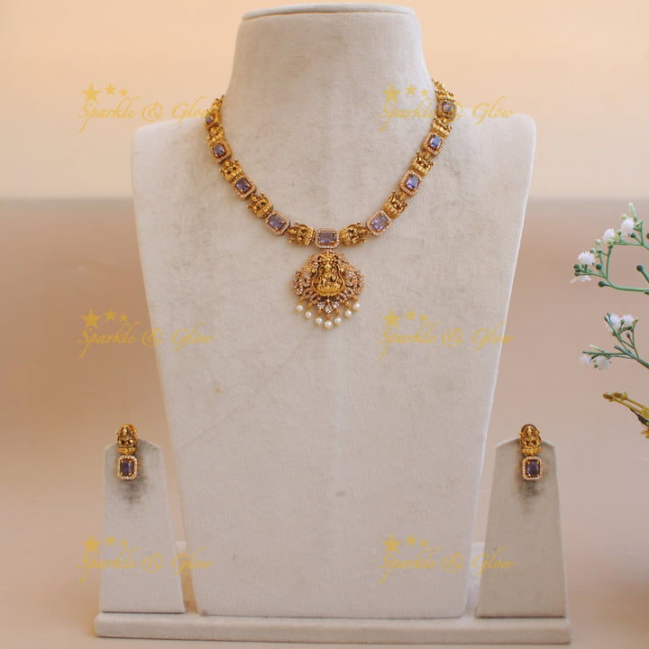 Elegant Lakshmi carved short necklace with CZ stones and pearls - purple