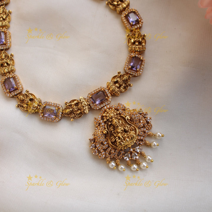 Elegant Lakshmi carved short necklace with CZ stones and pearls - purple