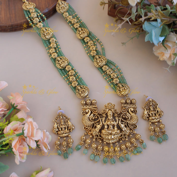 Gorgeous Lakshmi peacock elephant carved pendant multi layer pearl haram with gold beads - pearl