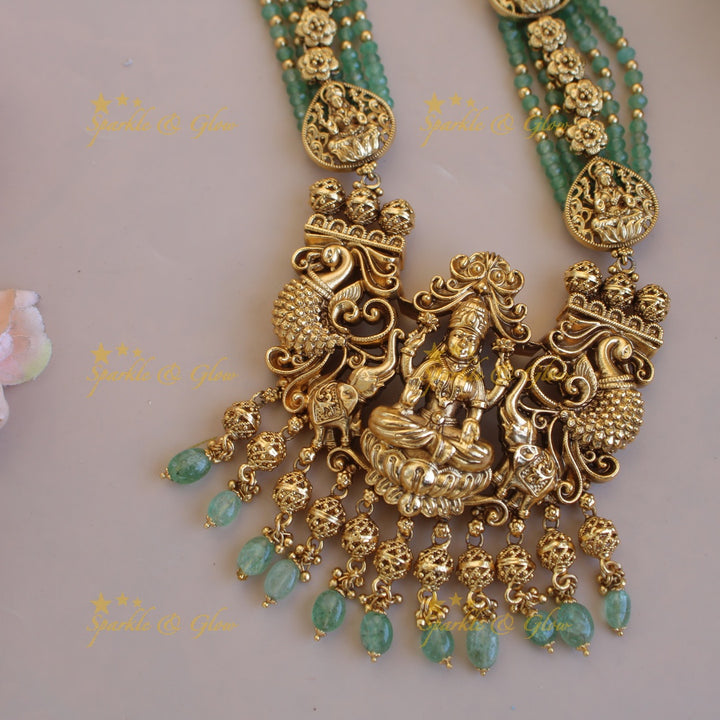 Gorgeous Lakshmi peacock elephant carved pendant multi layer beads haram with gold beads - mint green
