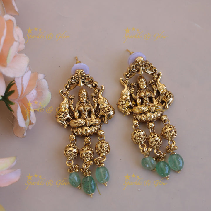 Gorgeous Lakshmi peacock elephant carved pendant multi layer beads haram with gold beads - mint green