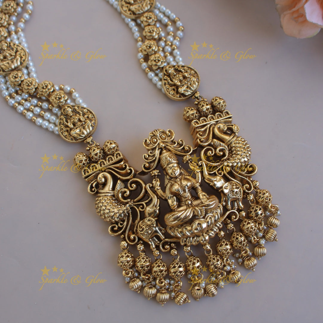 Gorgeous Lakshmi peacock elephant carved pendant multi layer pearl haram with gold beads - pearl