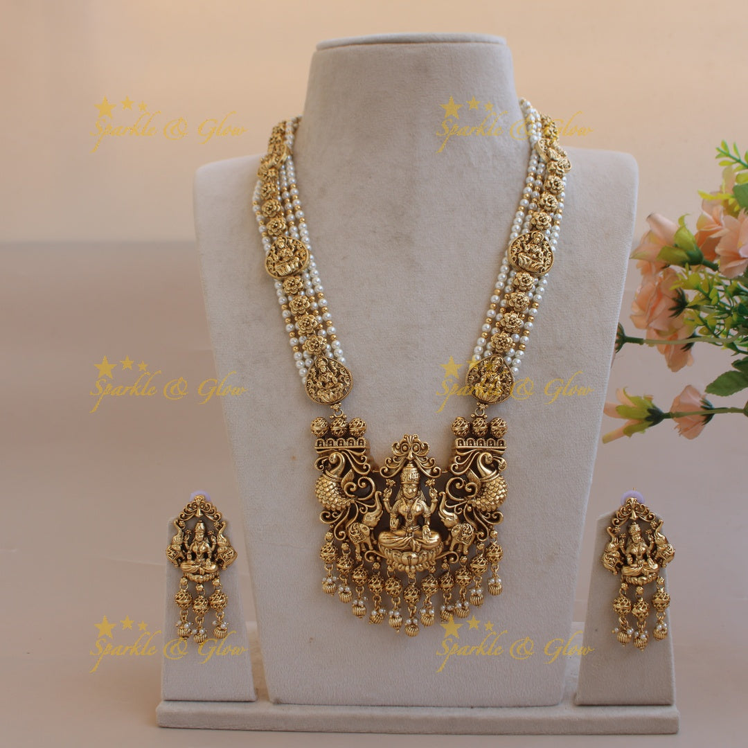 Gorgeous Lakshmi peacock elephant carved pendant multi layer pearl haram with gold beads - pearl