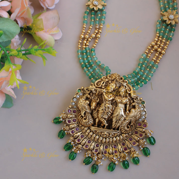 Exclusive Radha Krishna pendant multi layer gold and mint green beads haram with stones