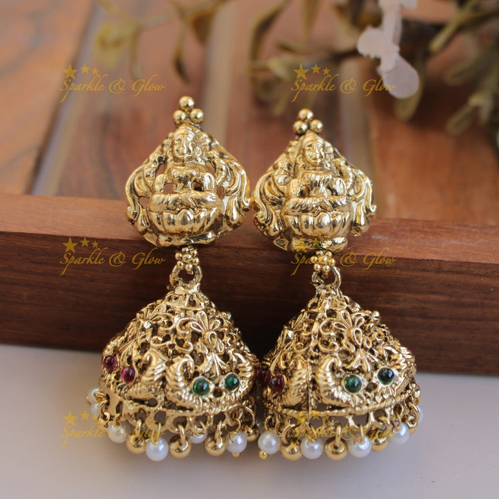 Grand Lakshmi peacock pendant four layer mint green beads haram with pearls and gold beads