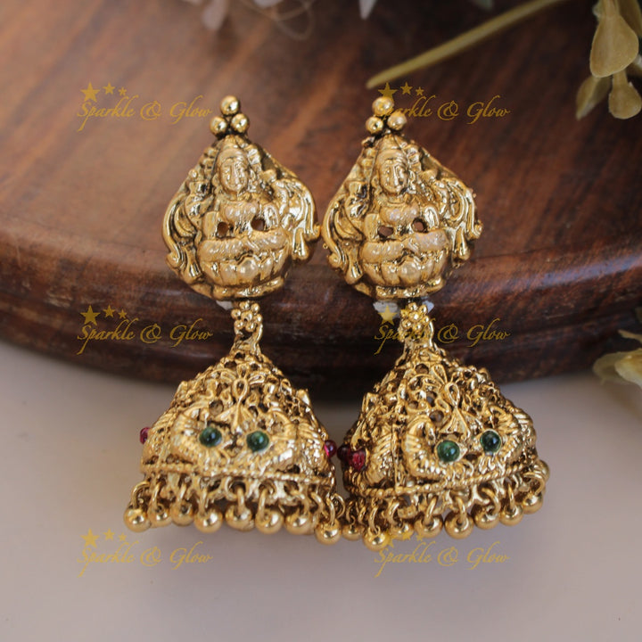 Elegant Lakshmi peacock pendant three layer mint green beads haram with gold beads