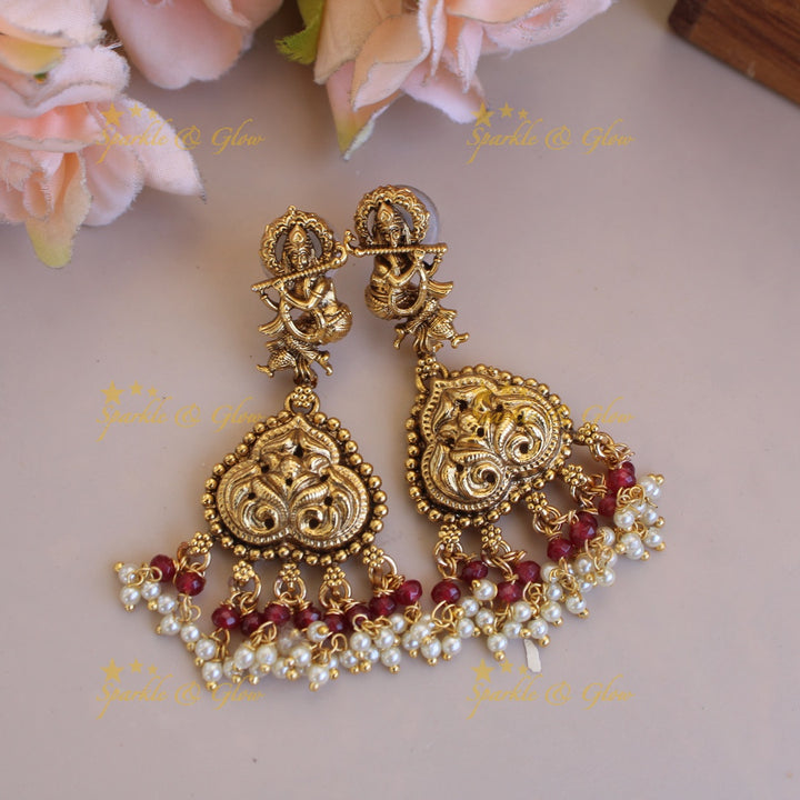 Gorgeous Krishna playing flute carved long necklace with pearls and maroon beads