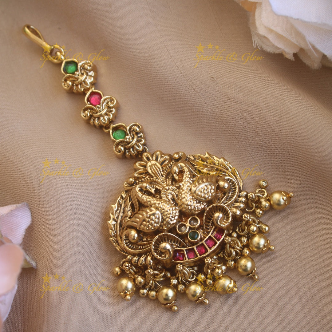 Simple jadau lakshmi with gold beads maang tikka