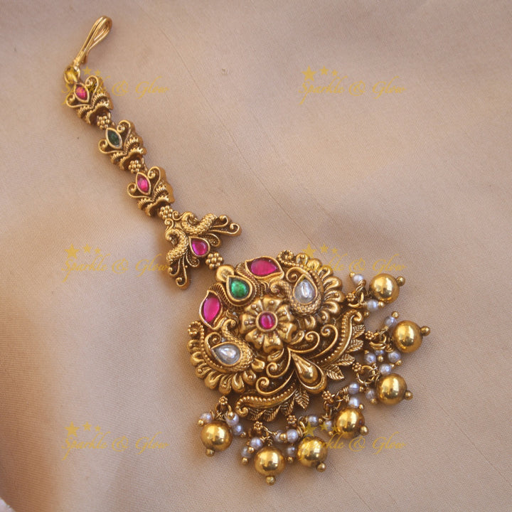 Stunning Peacock floral jadau maang tikka with gold beads