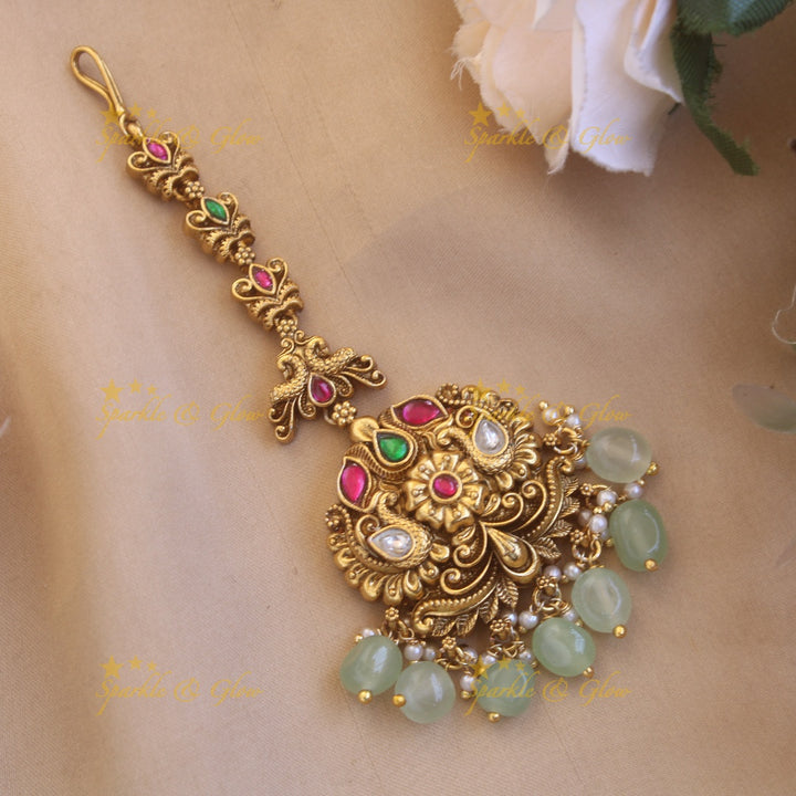 Stunning Peacock floral jadau maang tikka with gold beads
