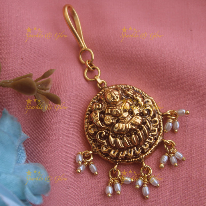 Gold alike Lakshmi maang tikka with pearls and mint green beads