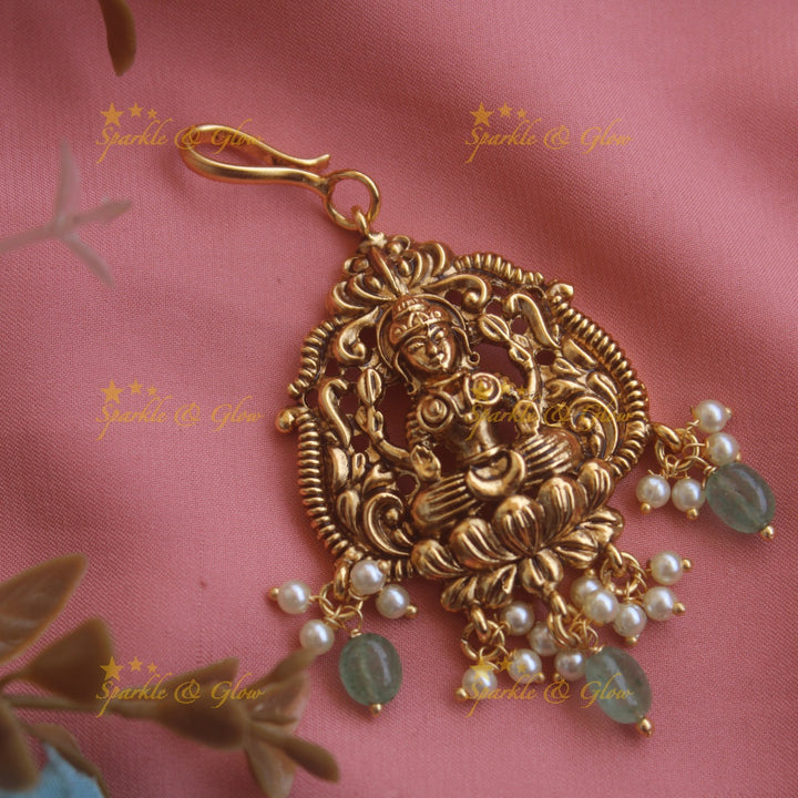 Beautiful Lakshmi carved maang tikka with pearls and mint green beads