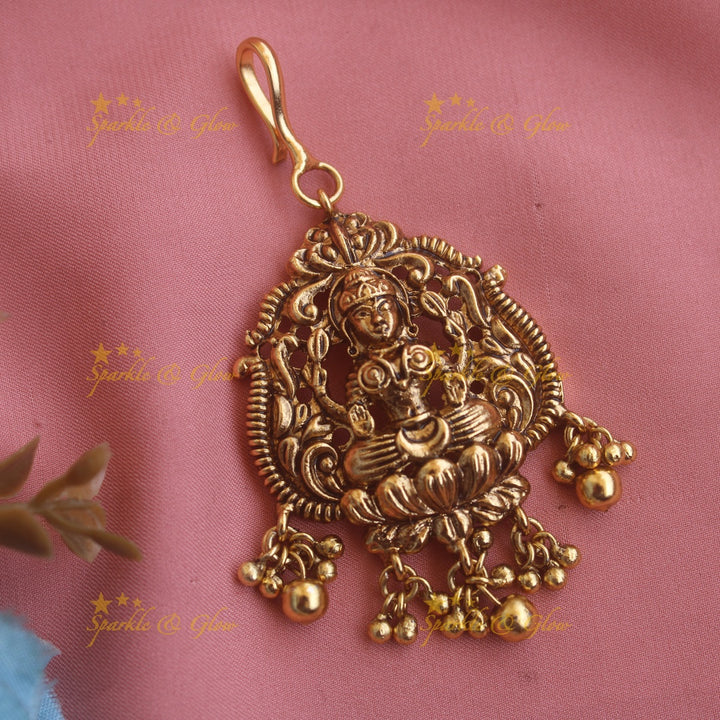 Beautiful Lakshmi carved maang tikka with pearls and mint green beads