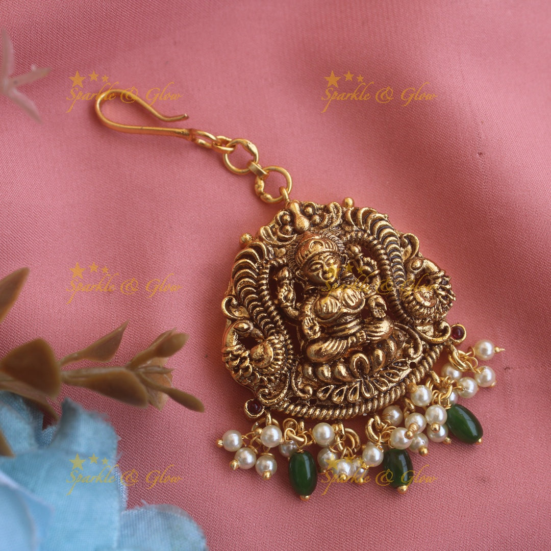 Gold alike Lakshmi peacock carved maang tikka with gold beads