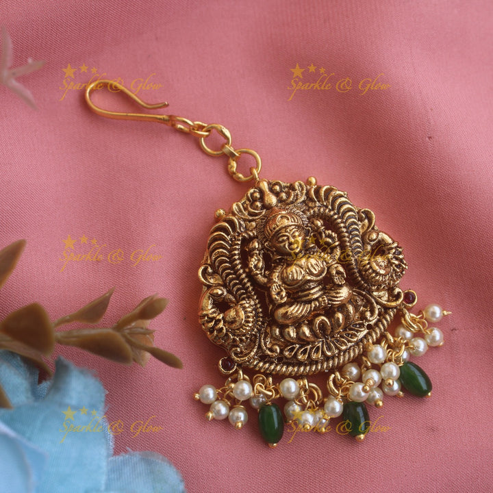 Gold alike Lakshmi peacock carved maang tikka with gold beads