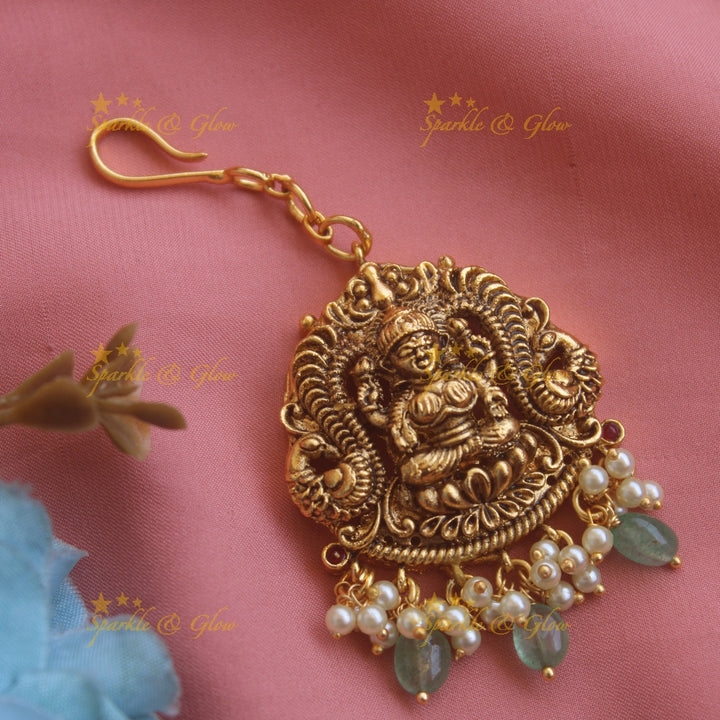 Gold alike Lakshmi peacock carved maang tikka with gold beads