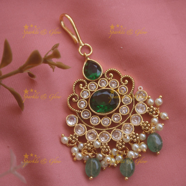 Elegant Floral maang tikka with red green white stones and mint green beads