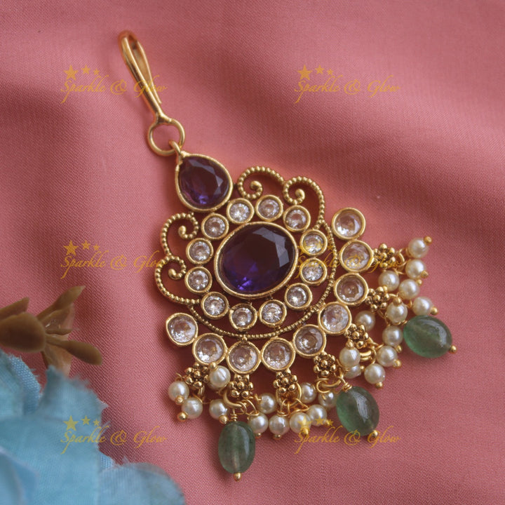 Elegant Floral maang tikka with red green white stones and mint green beads
