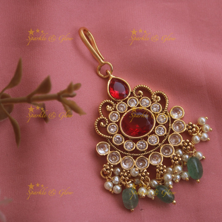 Elegant Floral maang tikka with red green white stones and mint green beads