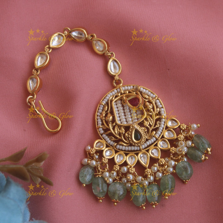 Statement floral leaf design kundan maang tikka with pearls and maroon beads