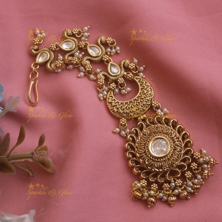 Stunning Floral half moon gutta pusalu maang tikka