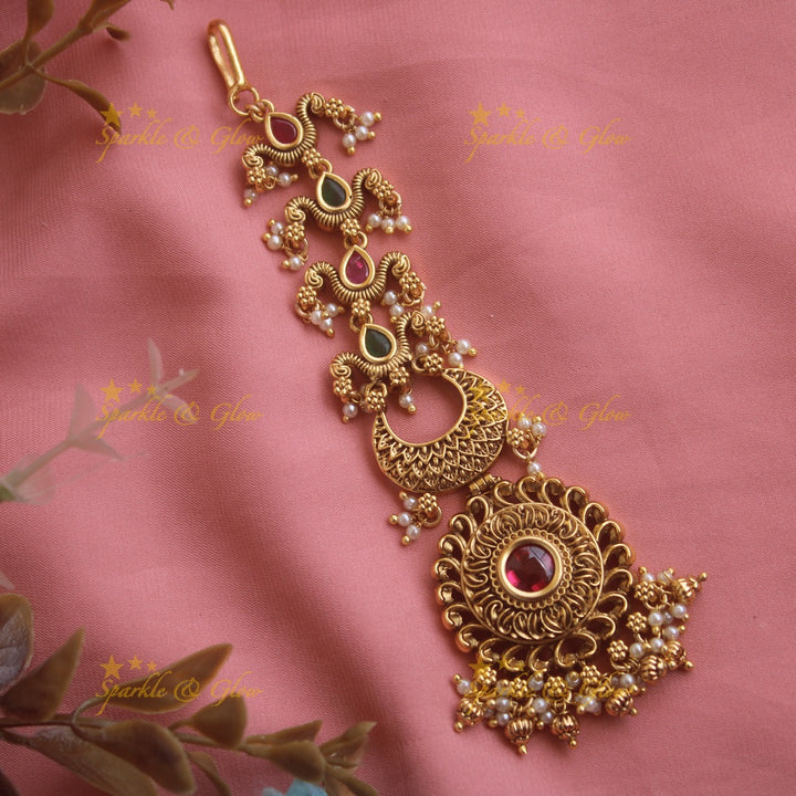 Stunning Floral half moon gutta pusalu maang tikka