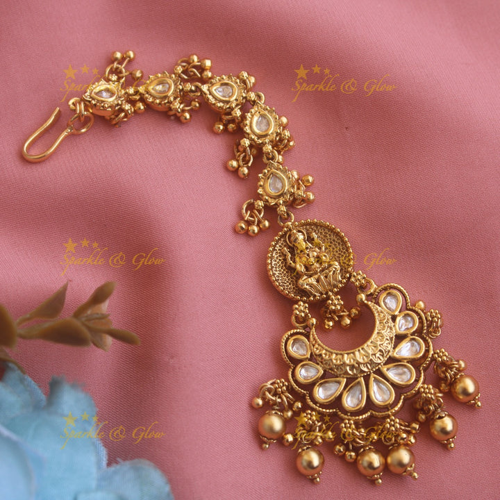 Beautiful Lakshmi half moon jadau maang tikka with red beads