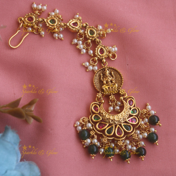 Beautiful Lakshmi half moon jadau maang tikka with red beads