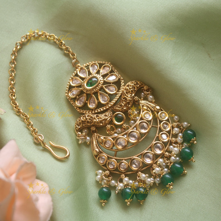 Grand Floral moon kundan maang tikka with green beads
