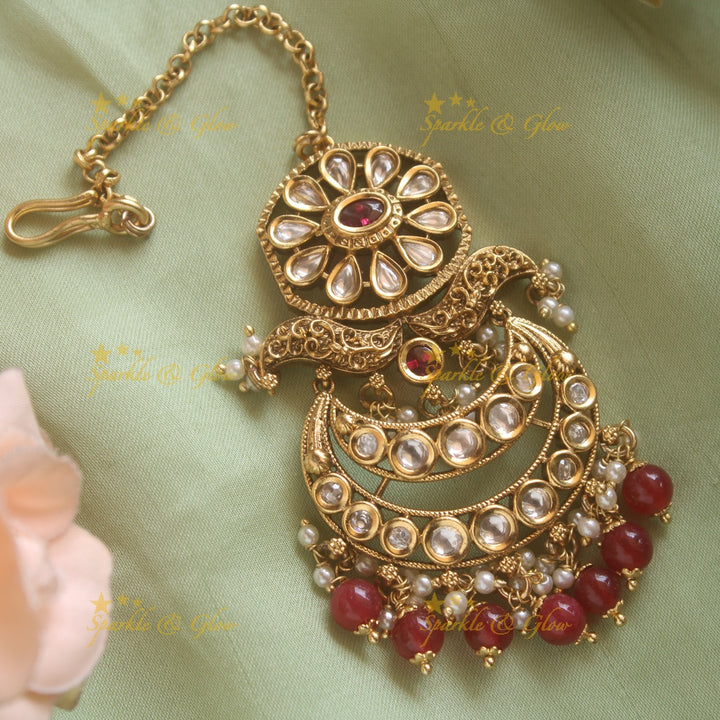 Grand Floral moon kundan maang tikka with green beads