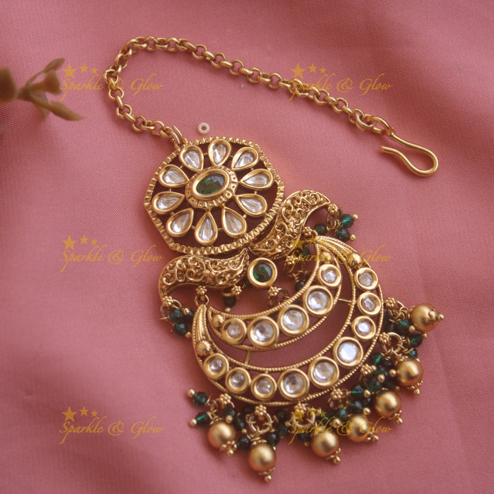 Grand Floral moon kundan maang tikka with green beads
