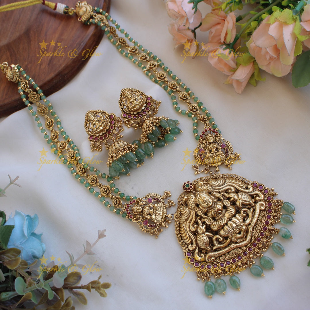 Exclusive Lakshmi elephant carved long necklace with ruby and mint green beads