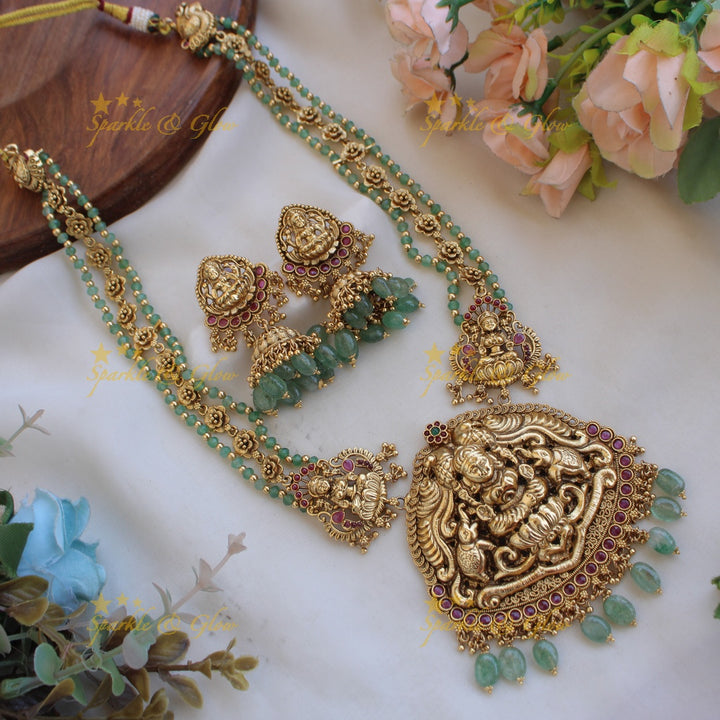 Exclusive Lakshmi elephant carved long necklace with ruby and mint green beads
