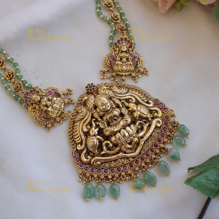 Exclusive Lakshmi elephant carved long necklace with ruby and mint green beads