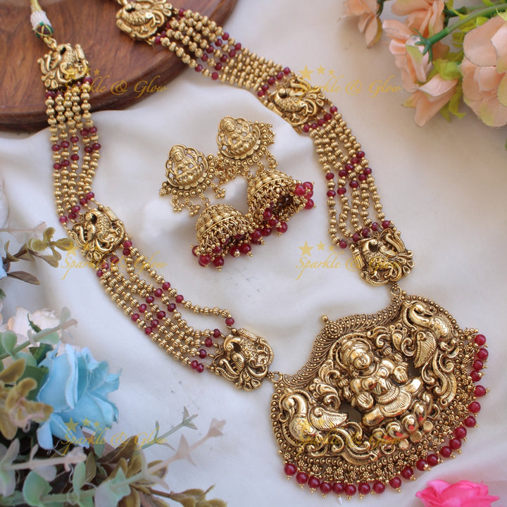 Exquisite Lakshmi peacock carved haram with multi layer beads chain - pearl and gold