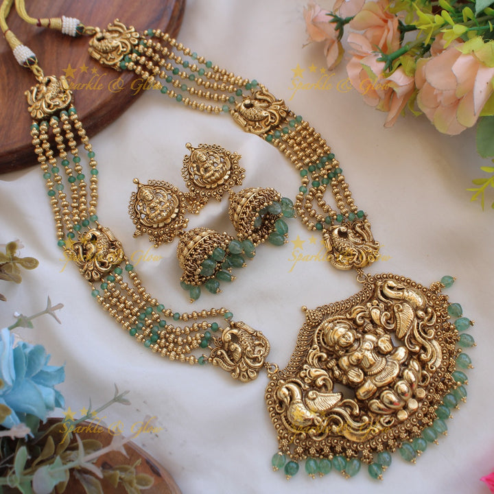 Exquisite Lakshmi peacock carved haram with multi layer beads chain - pearl and gold