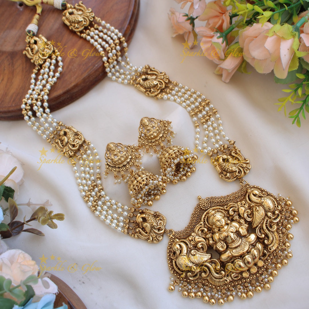 Exquisite Lakshmi peacock carved haram with multi layer beads chain - pearl and gold