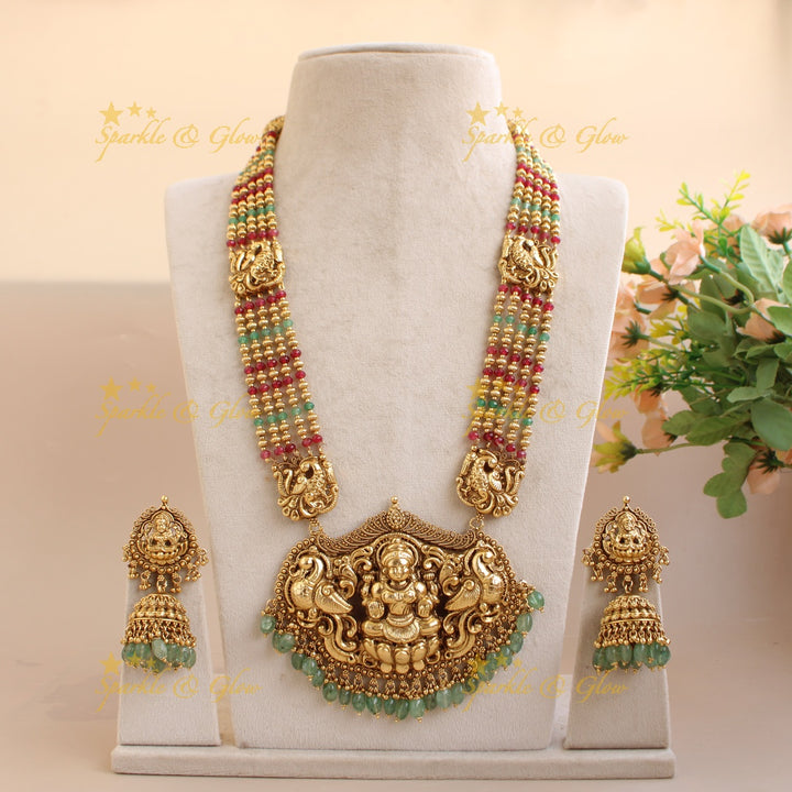 Exquisite Lakshmi peacock carved haram with multi layer beads chain - multi colour beads