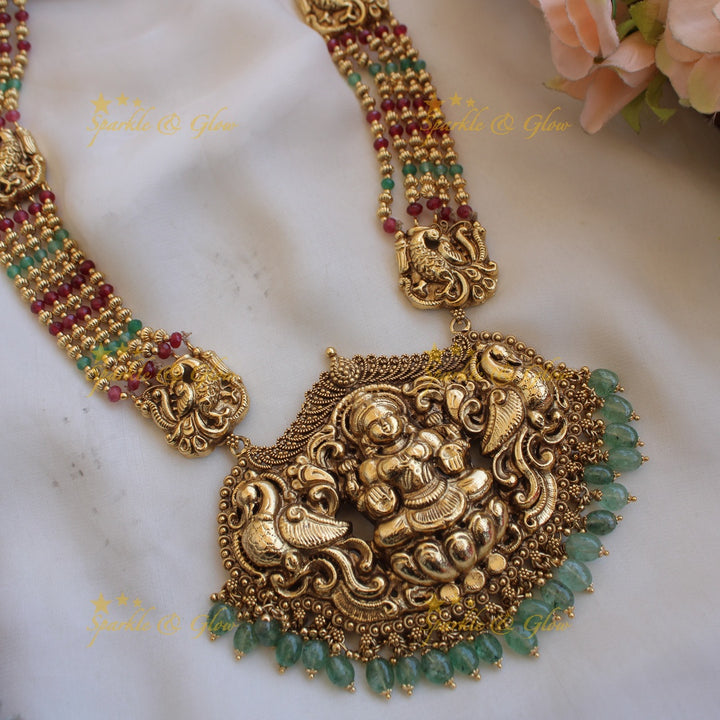 Exquisite Lakshmi peacock carved haram with multi layer beads chain - multi colour beads