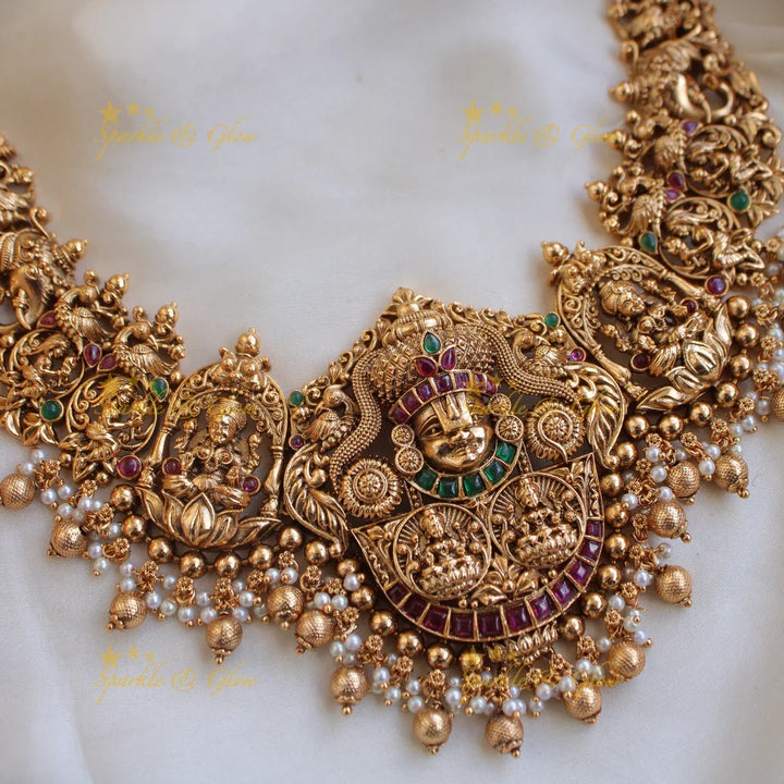 Gorgeous Lakshmi Balaji carved short necklace with ruby emerald pearls and gold beads - Sparkle and Glow