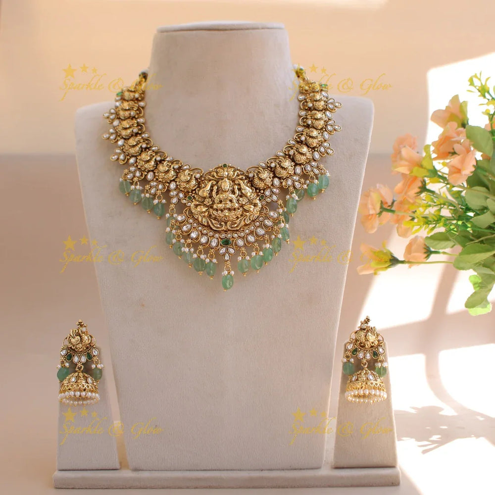 Stunning Lakshmi elephant and peacock carved short necklace with mint green beads and stones - white - Sparkle and Glow