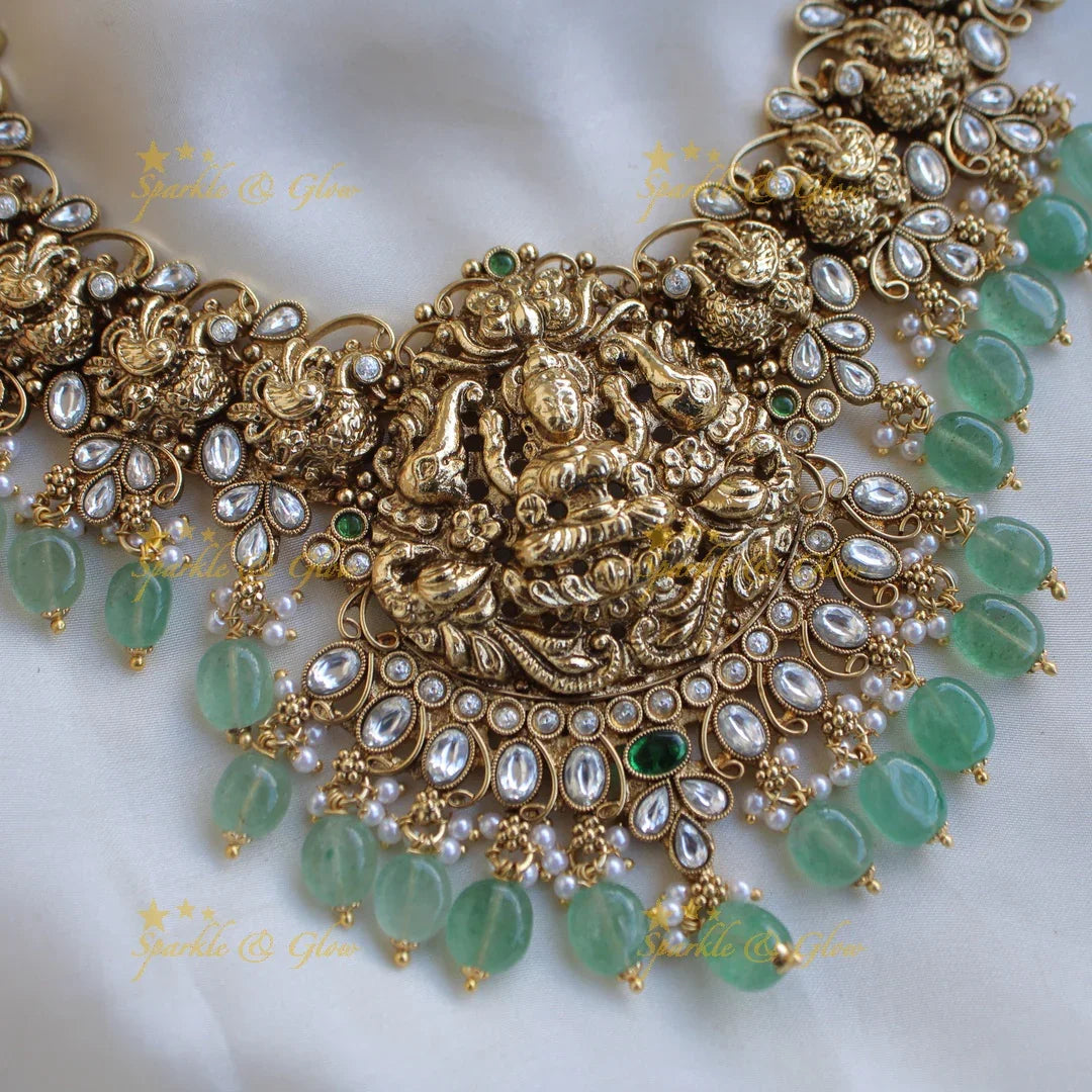 Stunning Lakshmi elephant and peacock carved short necklace with mint green beads and stones - white - Sparkle and Glow