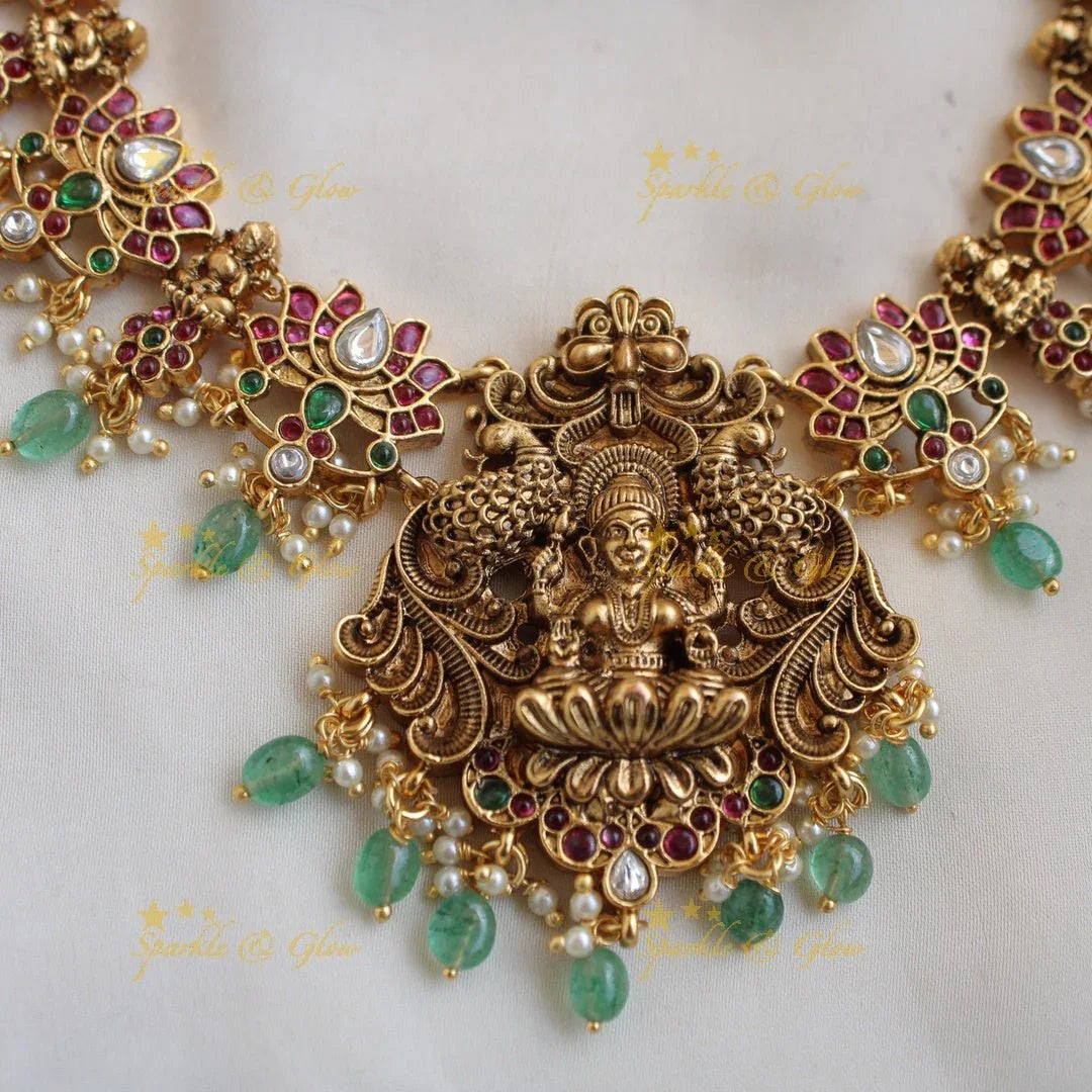 Elegant Lakshmi Lotus design kemp stone short necklace with pearls and mint green beads - Sparkle and Glow