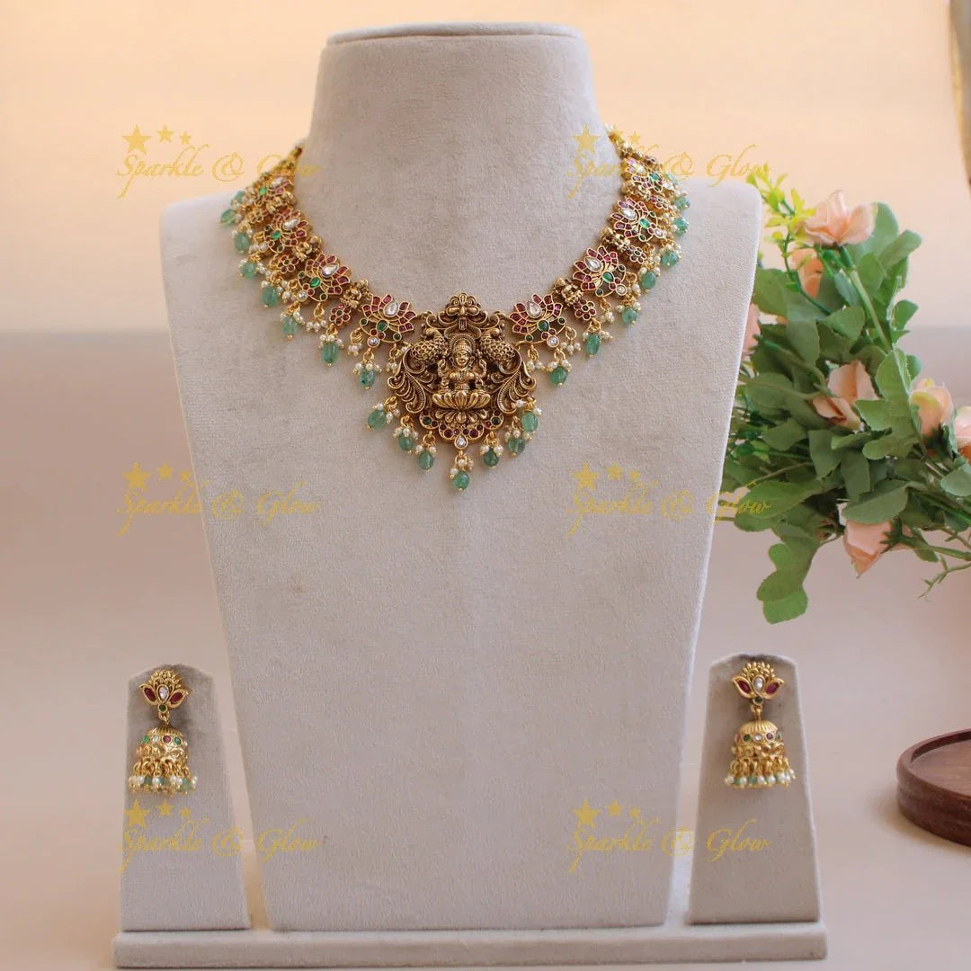 Elegant Lakshmi Lotus design kemp stone short necklace with pearls and mint green beads - Sparkle and Glow