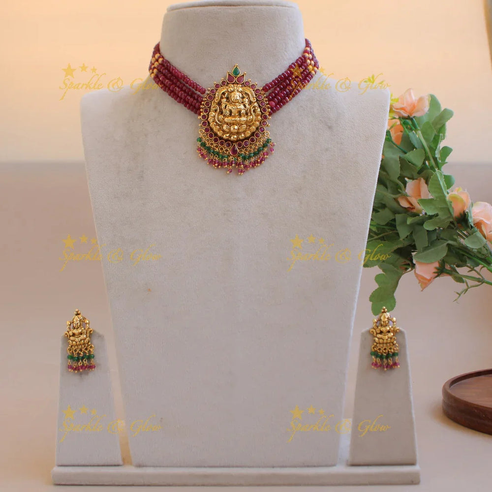 Elegant Lakshmi carved choker with multi layer beads ruby and pearls - maroon - Sparkle and Glow